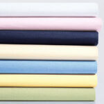 Spannbettlaken Spannbetttuch Schlafgut Mako Jersey für Kinderbett, aus Baumwolle, alle Farben (65×135 cm)